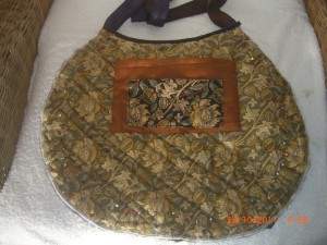 Inside of bag pined to the mens ties