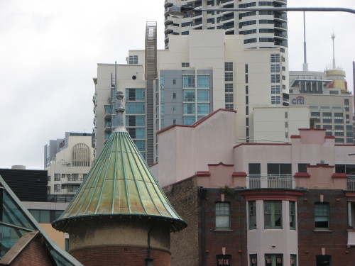 Love this photo it shows in the foreground the original copper tower of a building built around 1886  to several different areas 1930's to the sky scraper behind housing the cities hundreds of central city lovers. 