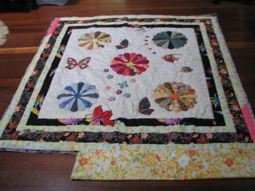 Finishing off quilt by adding a border