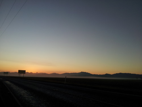 Dawn breaking over the farm land