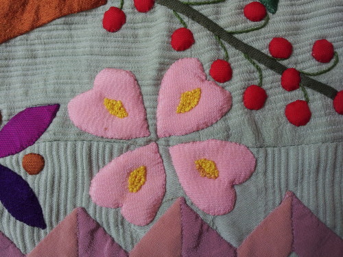 I used colonial knots to make my ovals inside the tiny hearts.  DMC thread to make the stems of the cherries. 