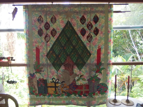 Hanging the quilt outside as it has been stored the last 10 months in the cupboard.  