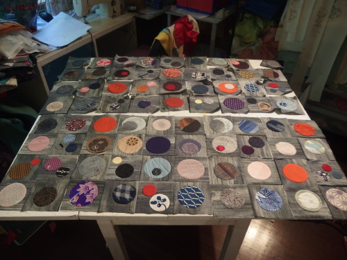 I'm still on track with my circles as far as making them but way behind where I would like to be with sewing them  together. 