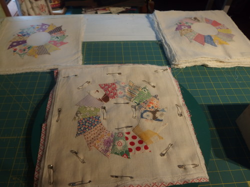 Pinned ready to quilt on the machine using bottom line.  