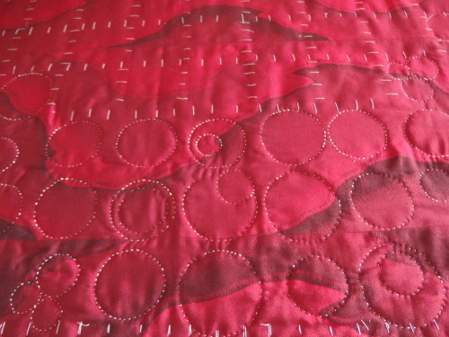 Back of the Quilty365 Circle quilt using sashiko hand quilting.  Im using a 100% crochet cotton. 