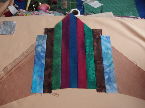 Adding two strips at a time using the same fabrics I used in my  centre star plus others from the same range.   