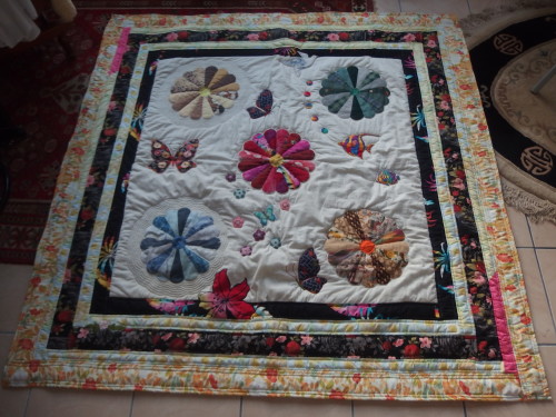 This was one of the first quilts I made. I was living in PNG and meeting up with a gr