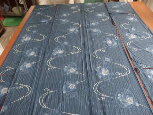 These panels are woven at 14inchs wide, and the design is set with a rice glue then dyed in indigo a long slow process but what a lovely soft soft look it gives. 