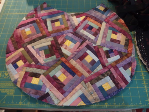 Back of bag finally complet;y covered with logcabin blocks I needed 15 all up to do this plus some strips to fill in some small holes. 
