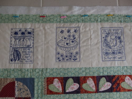 3 of the little Bluework blocks at the top of Sara's quilt. 