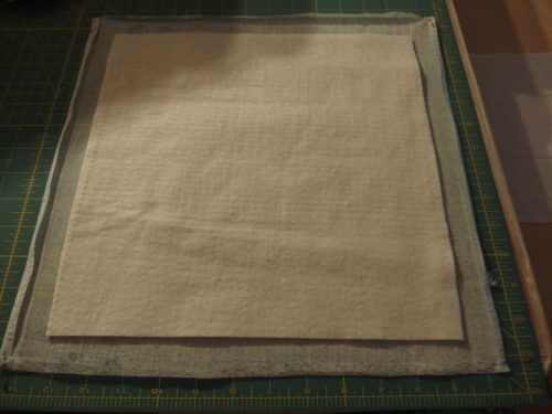 Have cut a 12inch square of wool batting and laid it on top of my backing. 