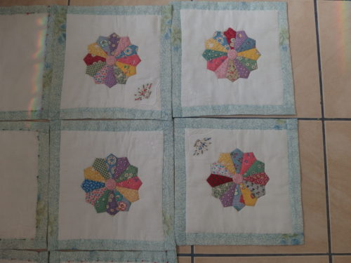 4 completed old-fashion hanky blocks.