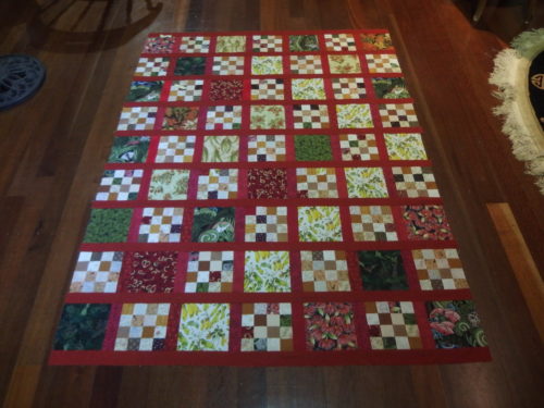 Ive just completed the last 3 rows and joined them to the main part of the quilt, just need to add the two side red strips and the top is finished then I have the fun of adding appliqué to it. 