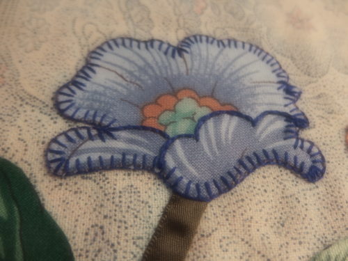 Close ups of flowers on my SG so you can see how I'm appliquéing the flower heads on and embroidering them 