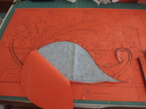 Isliced through the pattern were all the stems will go and then I can mark the abckgrou