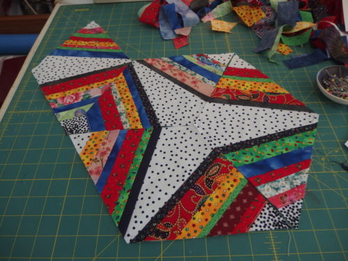 Just keep on adding triangles in to hexagons and then join hexagons up in to a quilt the size you want!!!!!