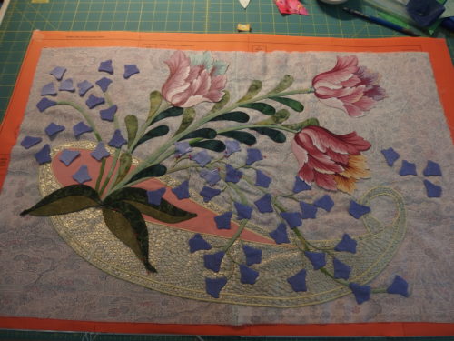 This is were Im up to now, 1/2 my leaves are applqiued on by machine and I hope to finish those today, ove 