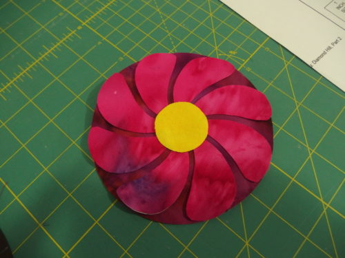 Large Lolly Pop flower, I cut out my back circle firs tthen cut my top petals all out of the one piece of fabric, both have iron on fusing behind them. 