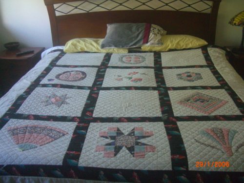 This is the first bed quilt I ever made over 20 years ago and it is still been used daily!!!!