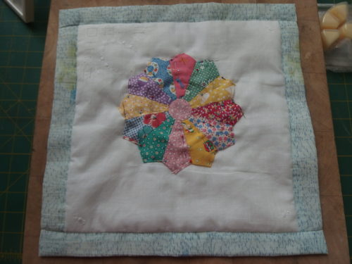 Today working on a wee hankie QAYG block, I ahve 4 more to make. 