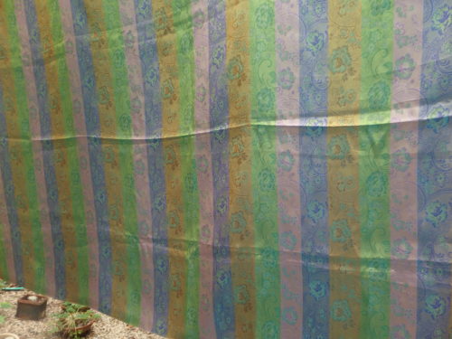 Back of fabric see all thsoe lovely rainbow colours they used in the warp. 
