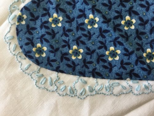 See close up NO lace but tiny stitches in back stitch to give the ellision of lace then the random