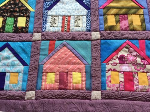 Now going to hand quilt those wee houses by hand have done the pink house and it was fun seeing it pop as a wee 3D house 